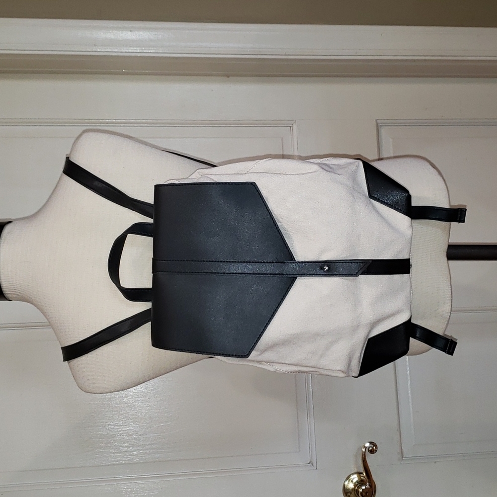 Deux Lux White & Black Canvas & Faux Leather Backpack